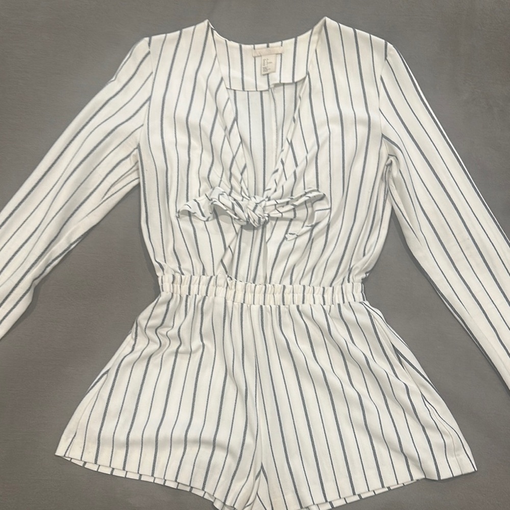 White and Black Pinstripe Jumpsuit with Ruffled V-Neck